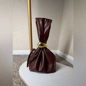 Elegant Brown Leather Bag with Gold Accent
